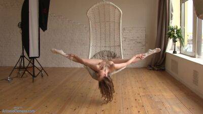 Flexible Beauty Ballerina Playfully Poses For Me In A Hanging Chair, Moving Her Long Legs Wide. 4 Of 6 - hclips