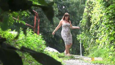 Curvy brunette relieves herself in public park by peeing and moaning in pleasure - sexu.com