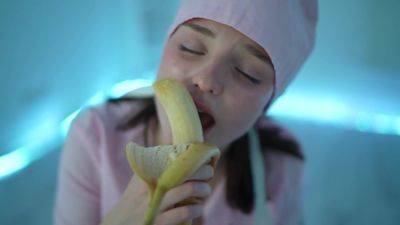 Young nurse and her banana - hclips