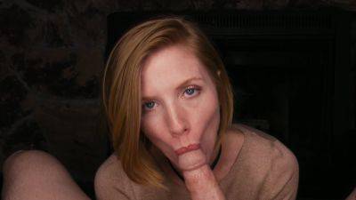 Freckled redhead throats the big dick and lets it explode on her face - xbabe.com